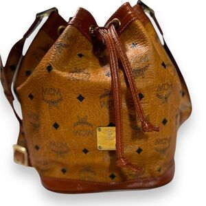 Vintage - MSRP $930 Authentic MCM Dessau Drawstring Bag in Visetos Cognac